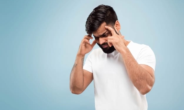 close up portrait young indian man white shirt concentrating suffering from headache 155003 23817