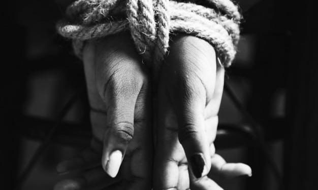 hands tied with rope around 53876 15327