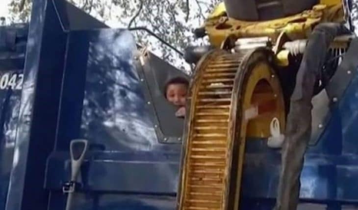 jongen in vuilniswagen | GFC