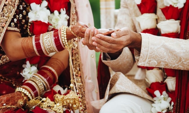 hands indian bride groom intertwined together making authentic wedding ritual 8353 10047