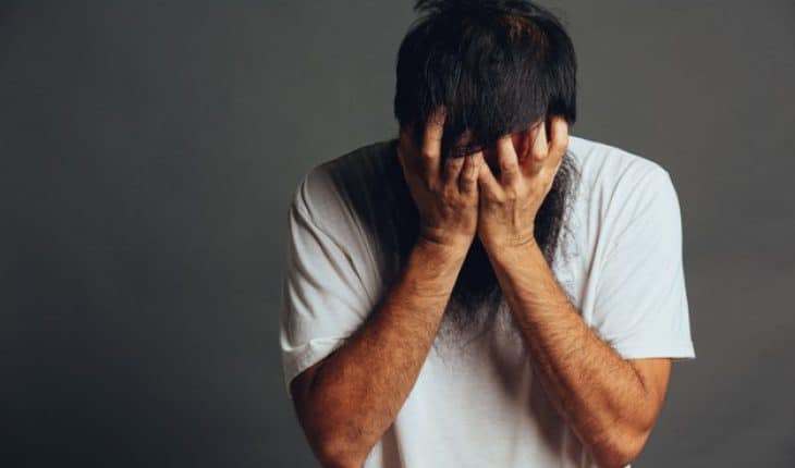man stress out cover his face by his hands 1150 27287 | GFC