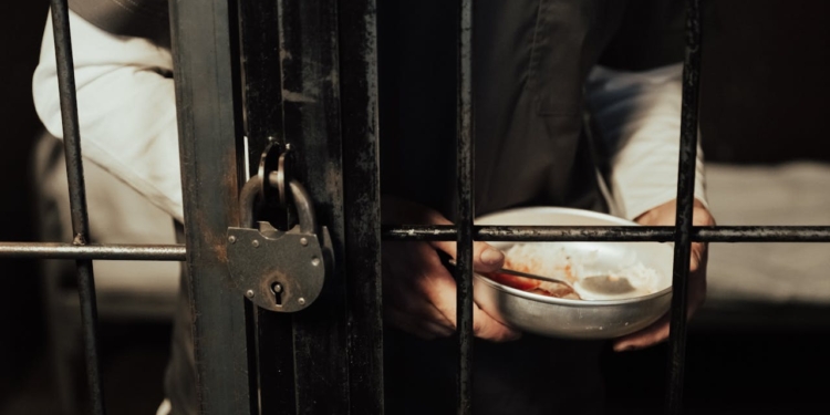 celstraf gevangene gevangenis handboeien arrest