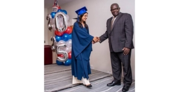 IHTC Minister Landveld congratulates Valedictorian
