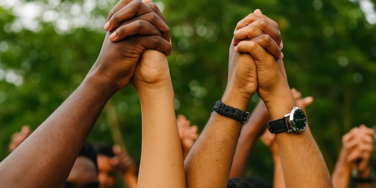 Eenheid handen samen